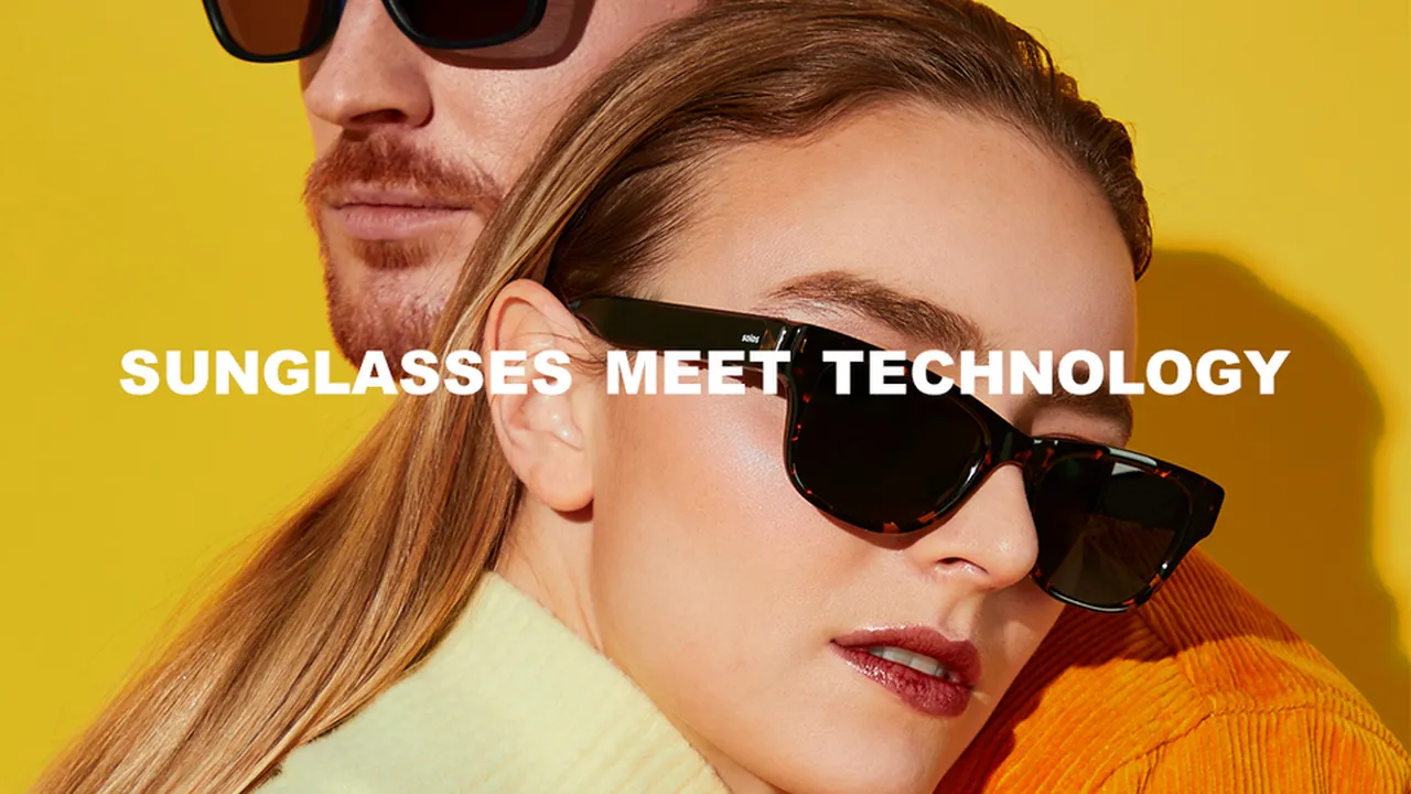 Two mint chocolate milkshakes with whipped cream and green sprinkles.