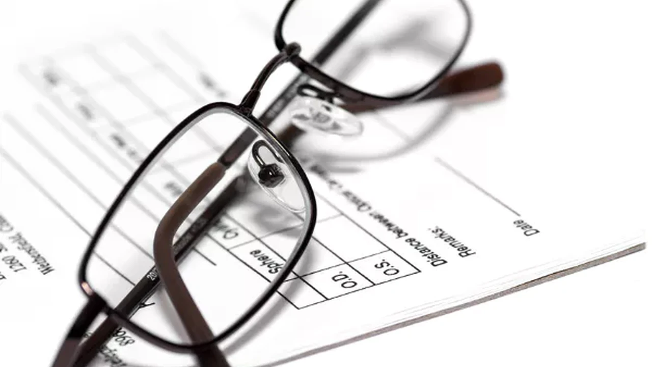 overhead view of corned beef sliced and on a platter with cabbage, potatoes, and carrots