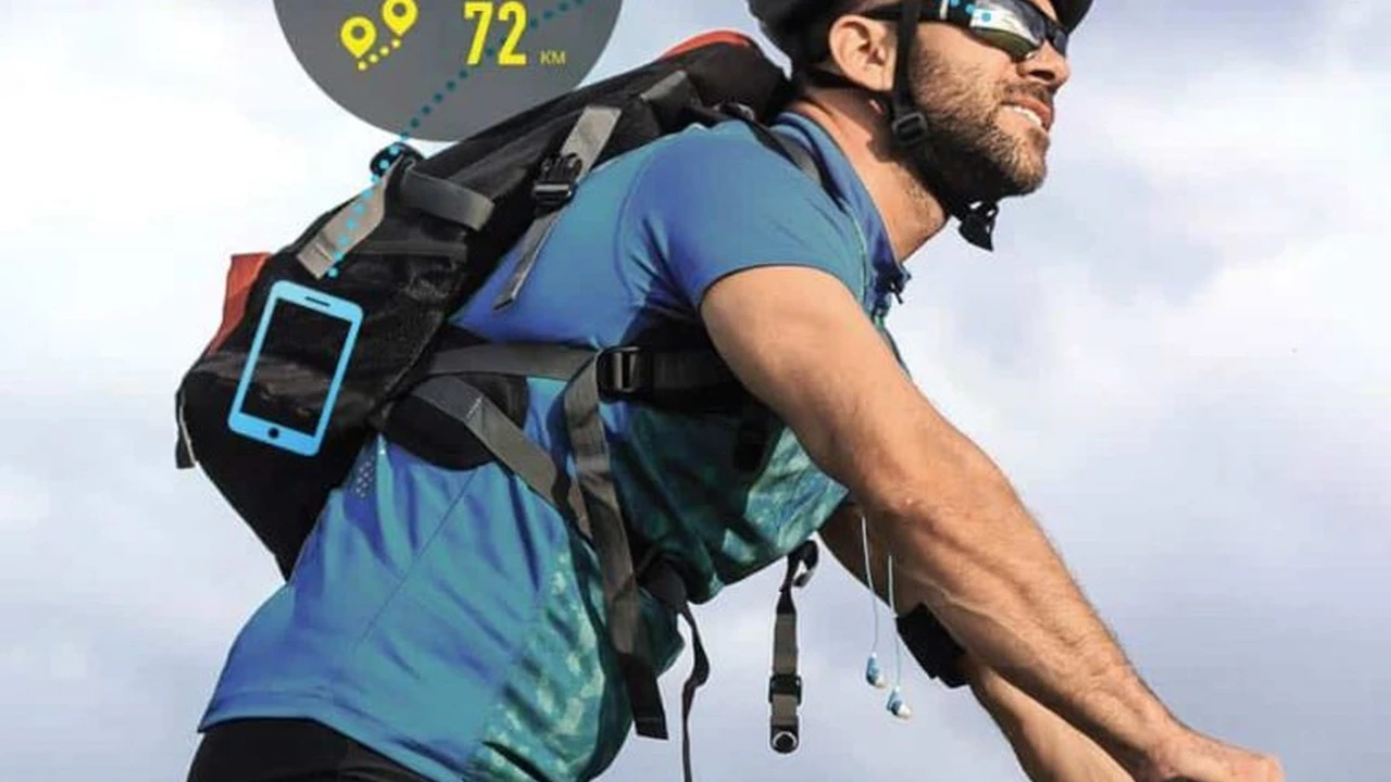 Close up on a plate of mashed potatoes, topped with baked pork chops with cream of mushroom soup, and a side of green beans.